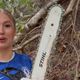 Chainsaw-wielding adult star Astrid Wett in bizarre tree stunt as she cackles evilly