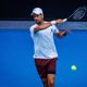 Australian open: Djokovic wins 100th match as record crowds flock