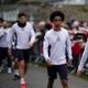Two exciting teenagers pictured with Man Utd first team squad in Ireland