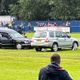 Five men charged after funeral hearse driven onto football pitch as players fled